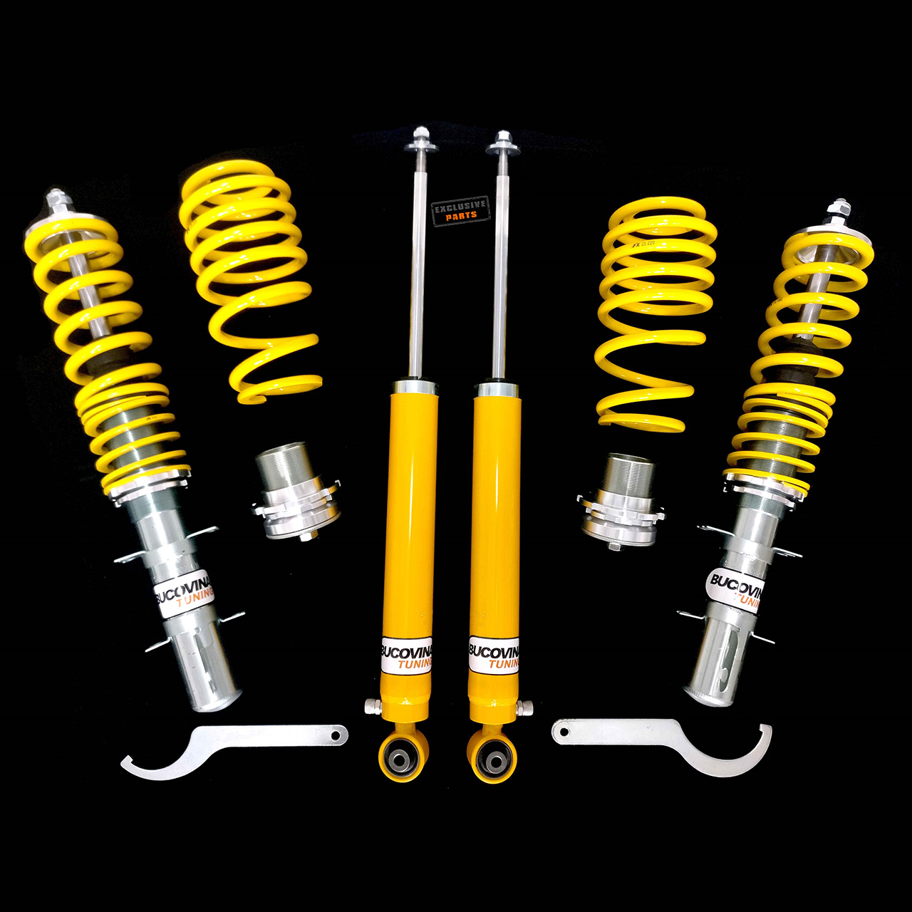 Kit coilover FK reglabil pe duritate Kit coilover FK reglabil pe duritate compatibil cu VW Golf 4, pe fundal negru, cu cupe de reglaj și chei