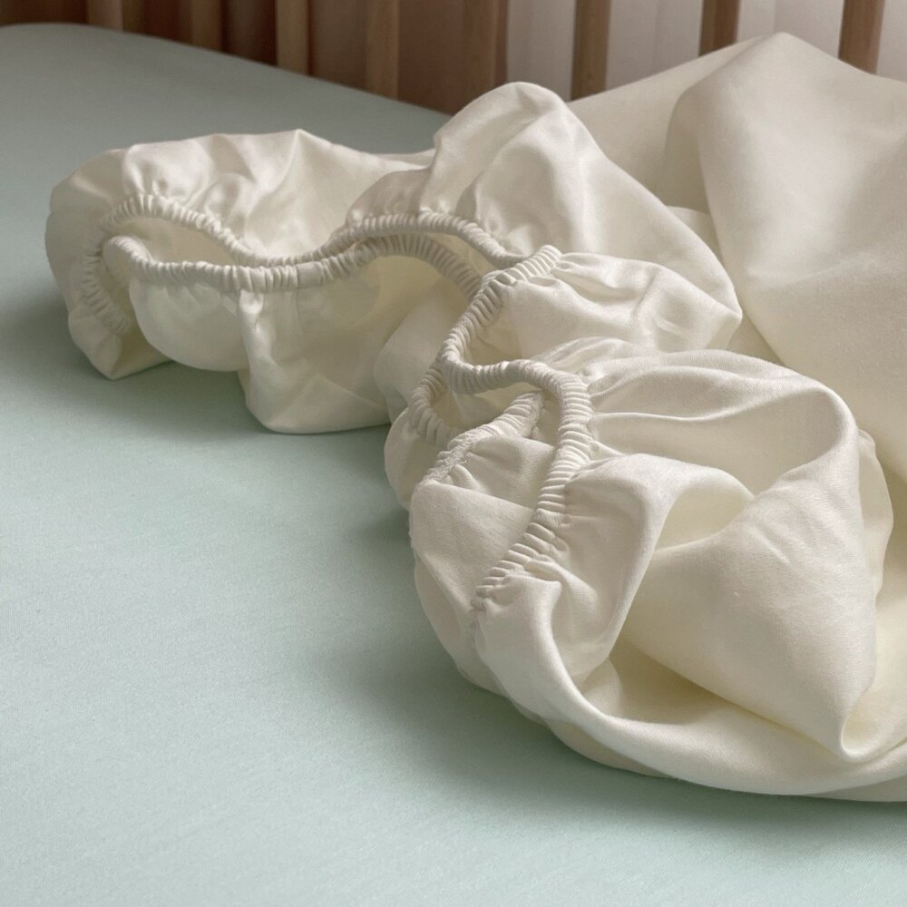 Husă de saltea pătuț 120 × 60 cm din satin, milky, vedere de ansamblu Husă de saltea pătuț 120 × 60 cm din satin, milky, vedere de ansamblu