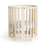 Pătuț evolutiv rotund-oval Maribelle 9 în 1, fildeș, vedere din lateral