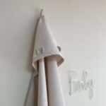 Prosop cu glugă din țesătură waffle pentru copii, cappuccino, 90 × 100 cm, detaliu al modelului