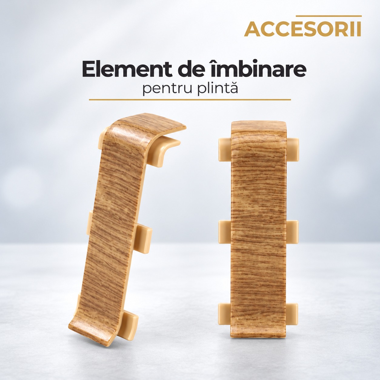 Element de îmbinare din PVC pentru plintă, tip stejar natur Element de îmbinare din PVC tip stejar natur pentru plintă, văzut din lateral și din față, cu lamelele de prindere