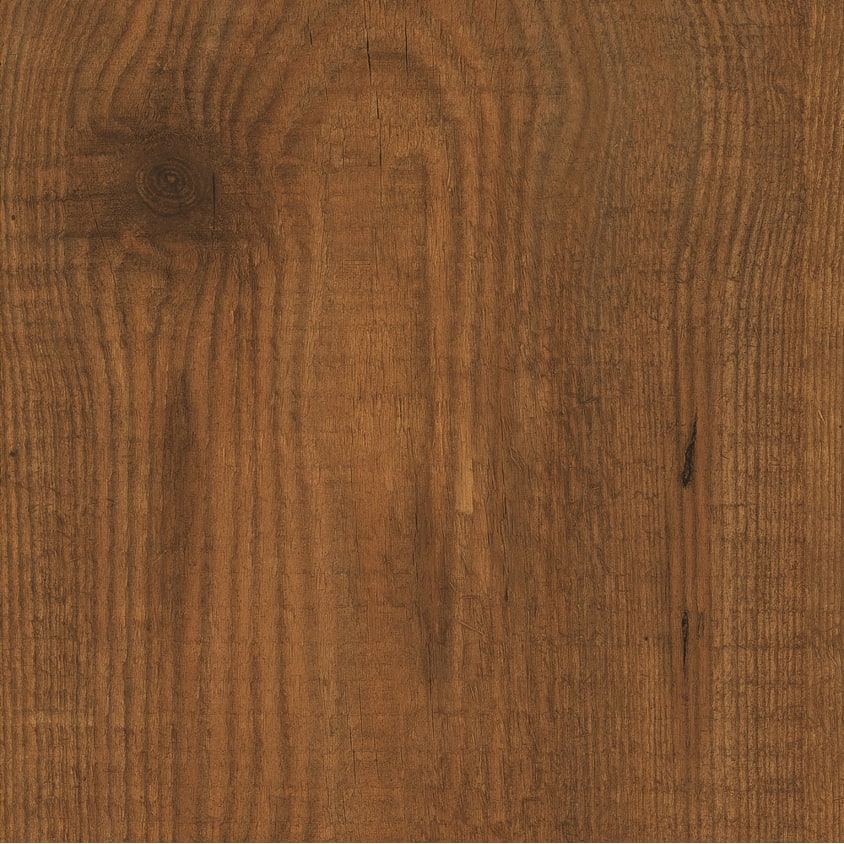 Decorul Fundermax 0803 Tyrol Pine văzut din față: pin rustic brun-roșcat, cu un nod mare, crăpături și urme de tăiere Decorul Fundermax 0803 Tyrol Pine văzut din față: pin rustic brun-roșcat, cu un nod mare, crăpături și urme de tăiere
