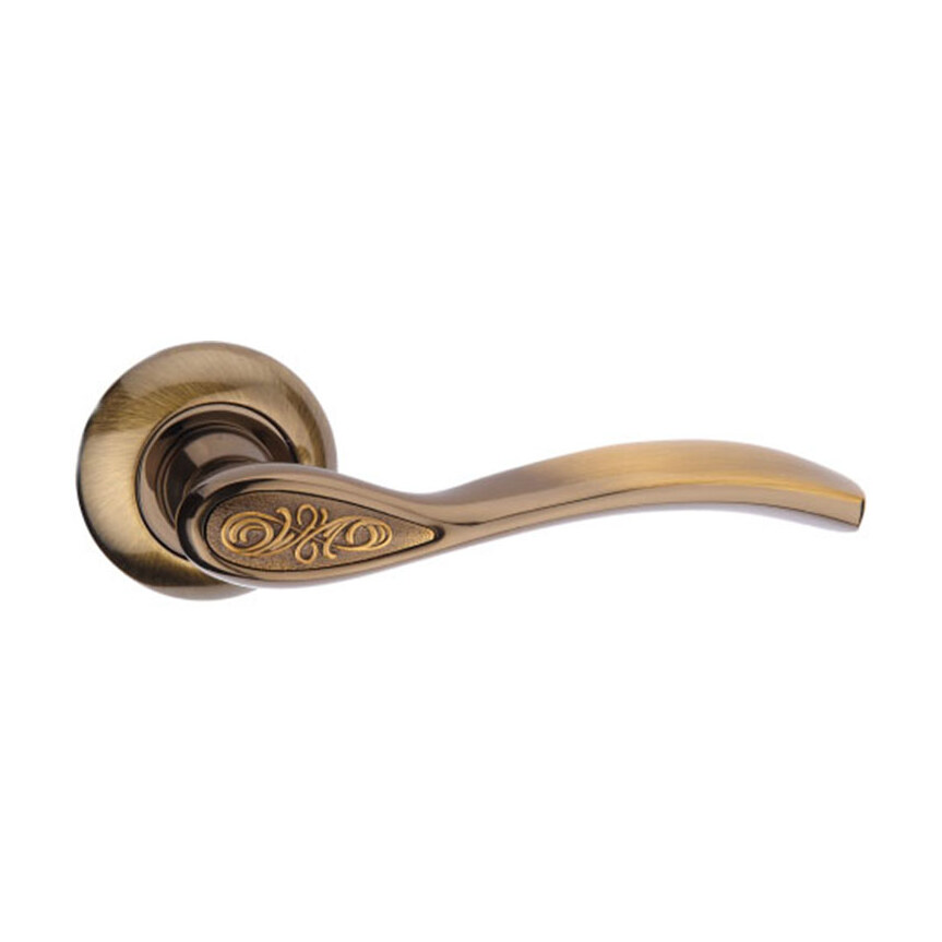 Mâner ușă Elite din zinc, bronz antichizat PCF, rozetă rotundă (A2-9446) Mâner de ușă Elite din zinc, bronz antichizat, cu manetă ondulată, medalion cu volute aurii și rozetă rotundă