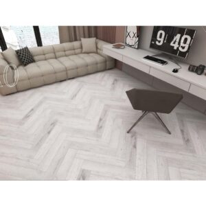 Parchet SPC Herringbone 80402 montat în spic într-o cameră cu canapea și birou