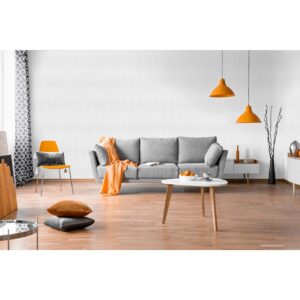 Living luminos cu canapea gri, lămpi portocalii și perete alb riflat, decorul terminației JC1022-W1